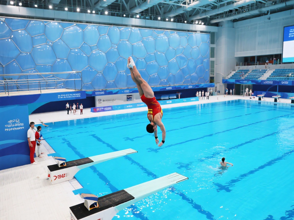 中国跳水队水立方备战奥运迎新挑战 另一方面,比赛场地带来的影响不容忽视。水